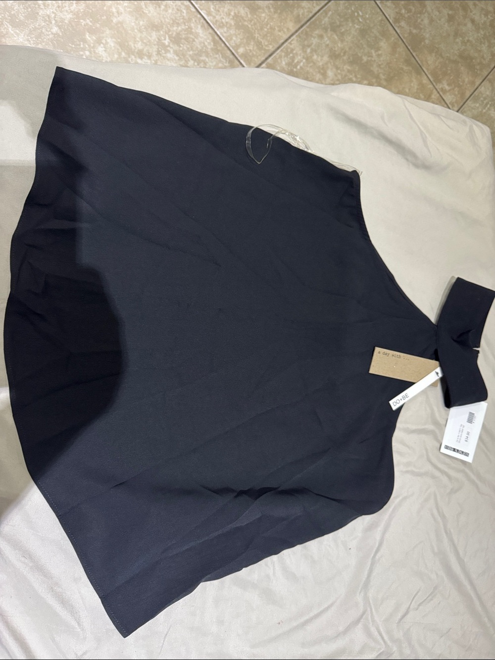 DO+BE Navy Sleeveless Peplum Top